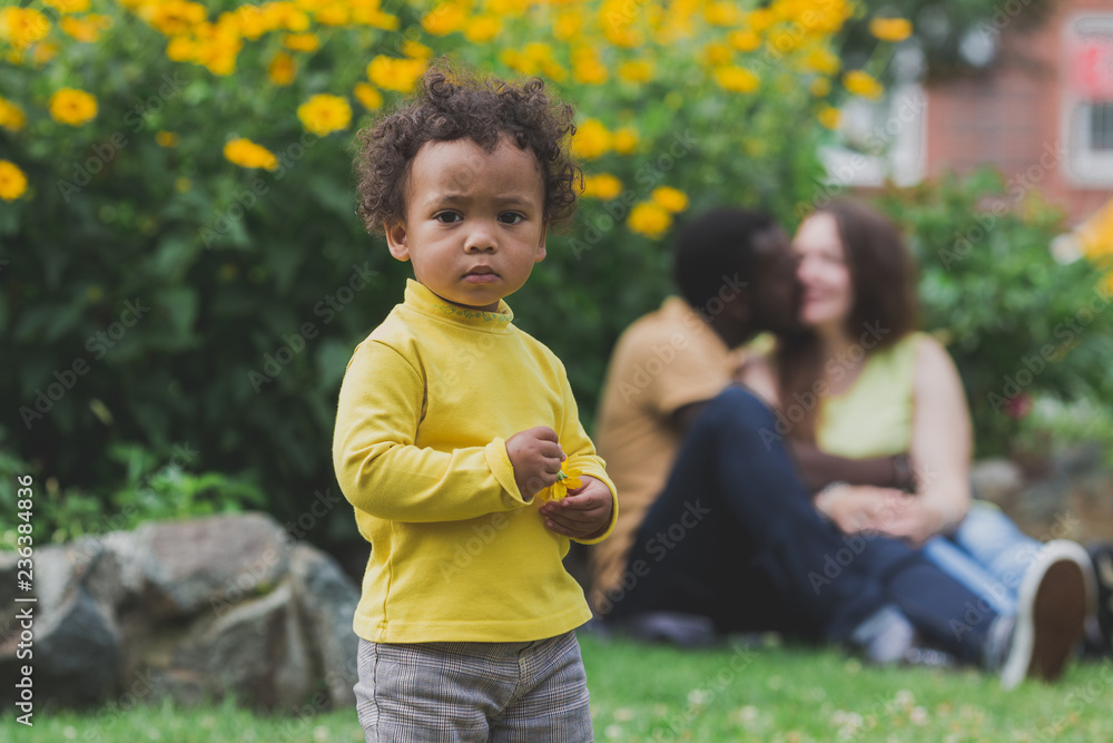 Multiracial mixed family concept. Black father and white mother Multiracial mixed family concept. Black father and white mother