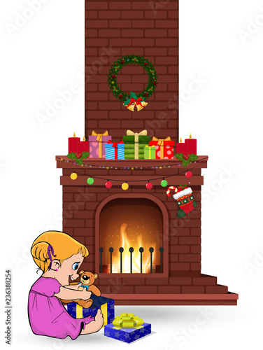baby girl open gift near decorated christmas fire place on white