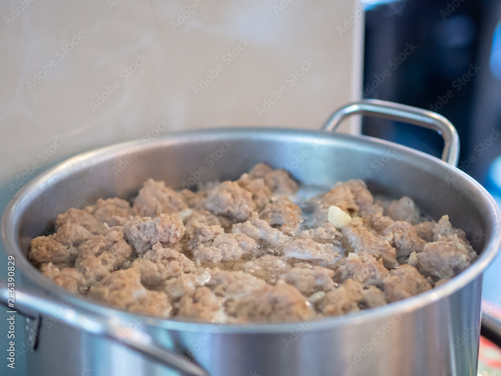 Close-up of boiling pork ball soup or boiled water in hot in pot boiling food. Close-up of boiling pork ball soup or boiled water in hot in pot boiling food.
