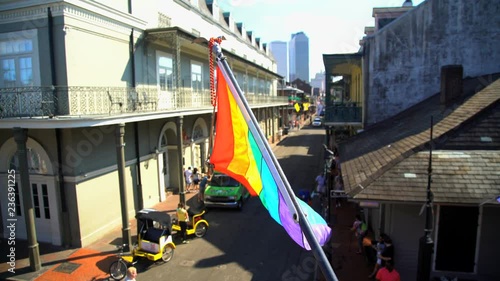 View of Rainbow flag on ornate buildings in the tourist French Quarter New Orleans Louisiana