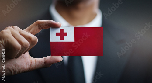 Businessman Holding Card of Tonga Flag