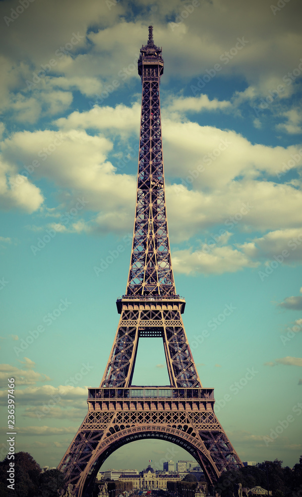 Eiffel Tower in Paris France with white clouds with photograph e