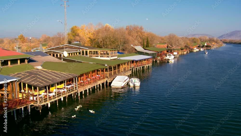 Complex of stilts houses and restaurants on the water. Stilts houses on the water, Ada Bojana, Montenegro Complex of stilts houses and restaurants on the water. Stilts houses on the water, Ada Bojana, Montenegro