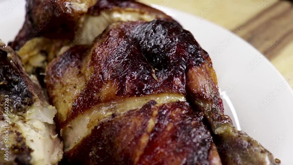 Close up of chicken cut into quarters. Close up of chicken cut into quarters.
