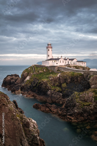 Lighthouse on a Ciffs Edge photo