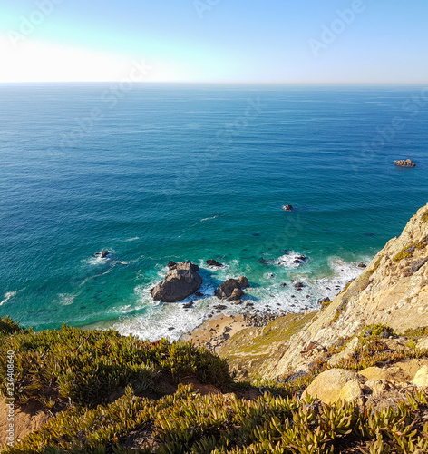 Cliffs over the Atlantic ocean. The westernmost point in Europe. The edge of the land. Cape Roca or Cabo da Roca, Portugal.