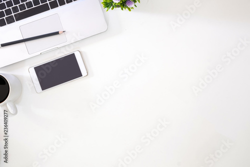 Wallpaper Mural Office desk with top view ,laptop computer and smartphone with cup of coffee on table, Copy space and work space. Torontodigital.ca