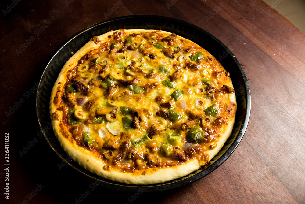 Pizza Pan take from top view with dark brown wood Pizza Pan take from top view with dark brown wood
