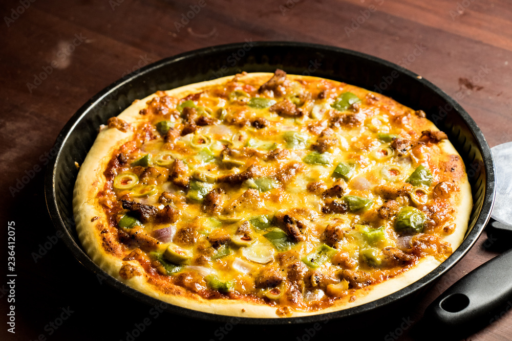 Pan Pizza take from very closeup Pan Pizza take from very closeup