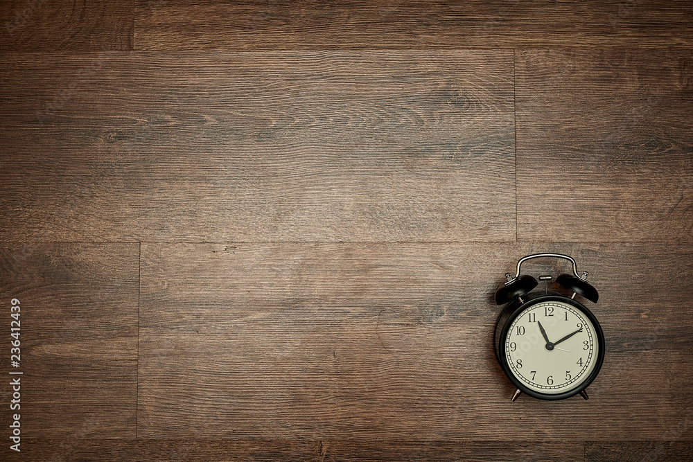 pointer clock on wood background pointer clock on wood background