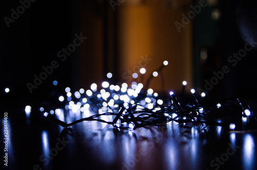 Christmas background. Festive elegant abstract background with bokeh lights and stars