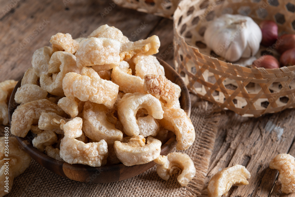 Pork rinds also known as chicharon or chicharrones , kab moo
