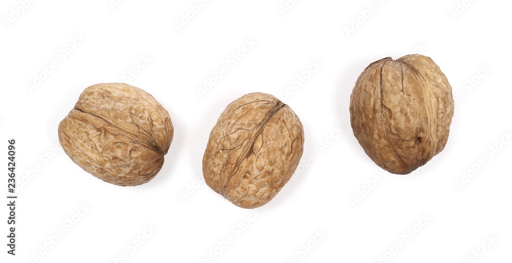 Walnuts, isolated on white background, top view Walnuts, isolated on white background, top view