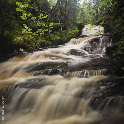 Mountain stream after rainfalls, Jonsvatnet, Norway photo