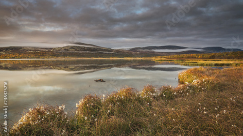 Sunrise over Hjerkinnsdammen lake, Dovre mountains.