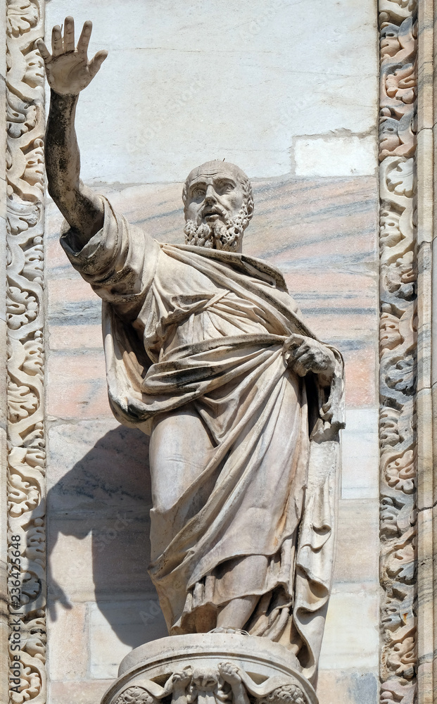 Fototapeta premium Apostle, statue on the facade of the Milan Cathedral, Duomo di Santa Maria Nascente, Milan, Lombardy, Italy
