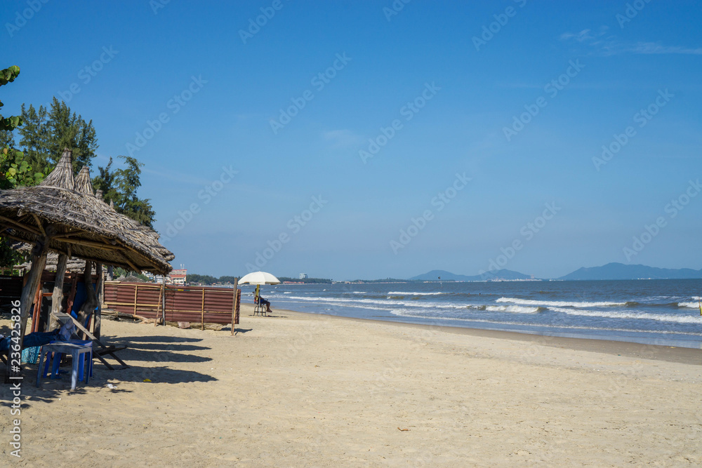 Fototapeta premium Beachfront Bar View in Vung Tau, Vietnam with Blue Sky