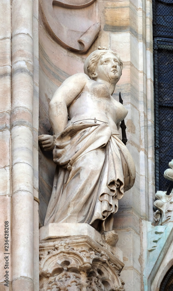 Saint Agatha of Sicily, statue on the Milan Cathedral, Duomo di Santa Maria Nascente, Milan, Lombardy, Italy