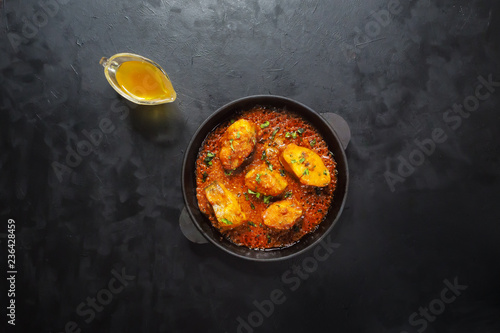 Kerala cuisine - tasty coconut mango fish curry.