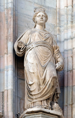 Statue of Saint on the facade of the Milan Cathedral, Duomo di Santa Maria Nascente, Milan, Lombardy, Italy © zatletic