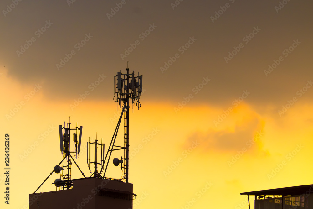 Signal Tower or Mobile telecommunication tower, black and white background.