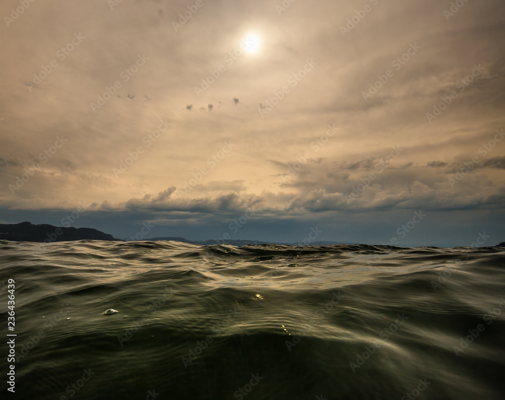 Close up on wavy water surface. Norwegian fiord. Close up on wavy water surface. Norwegian fiord.