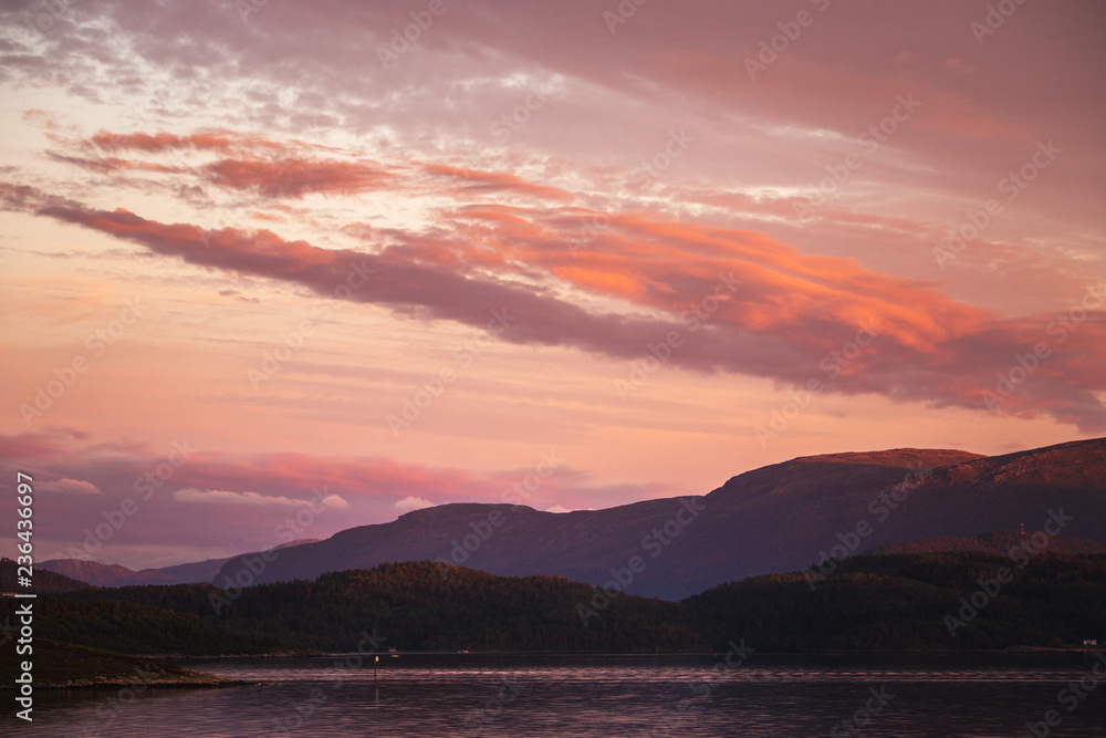 Amazing sunset light and colours by the shores of Gjerdavika, Norway.