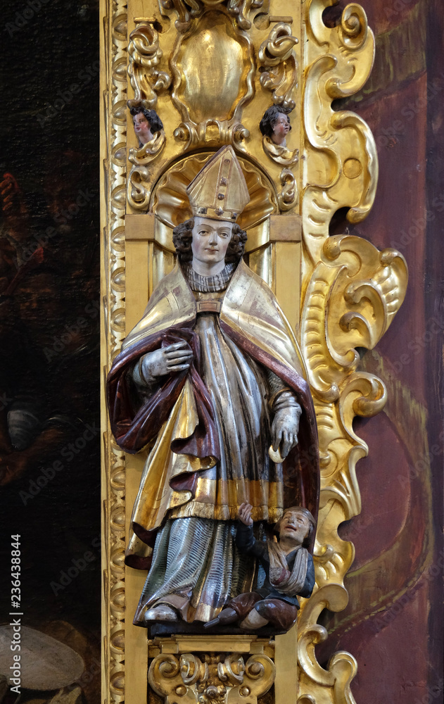Saint Martin statue on the altar of Saint Leodegar in the church of St. Leodegar in Lucerne, Switzerland