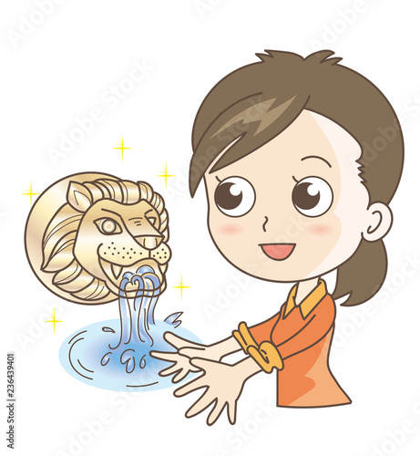 伝統的な噴水・ライオン蛇口と女性