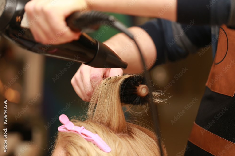 Naklejka premium Blow dryer brush hair