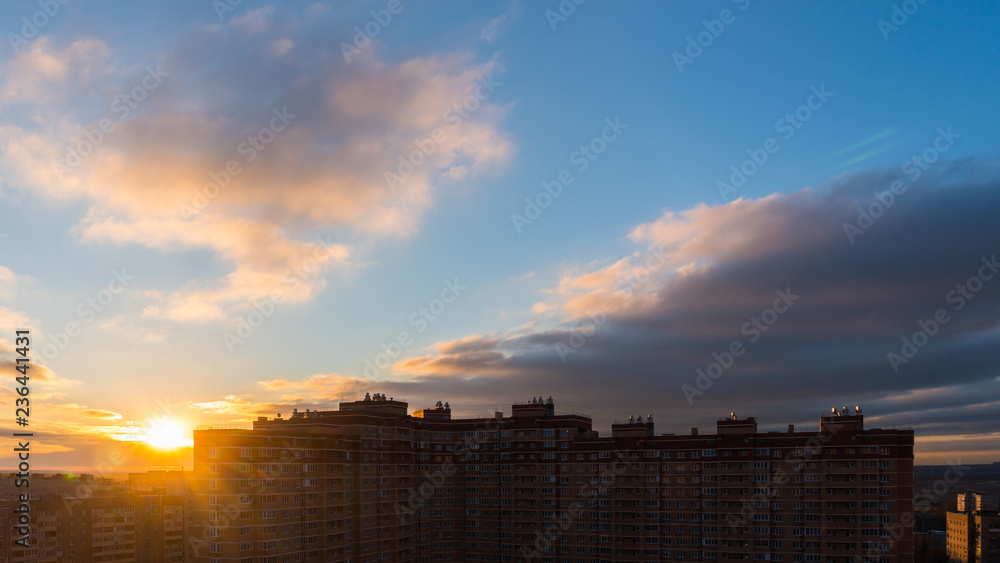 Sun rising over city Sun rising over city