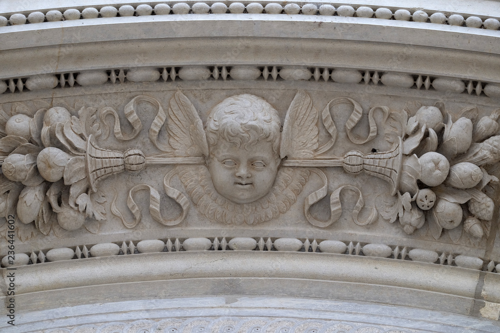 Angel, relief on the portal of the Cathedral of Saint Lawrence in Lugano, Switzerland