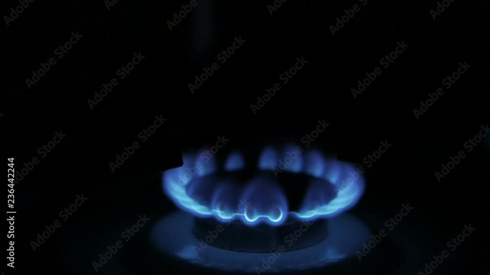 Natural gas inflammation in stove burner. Russian gas Natural gas inflammation in stove burner. Russian gas