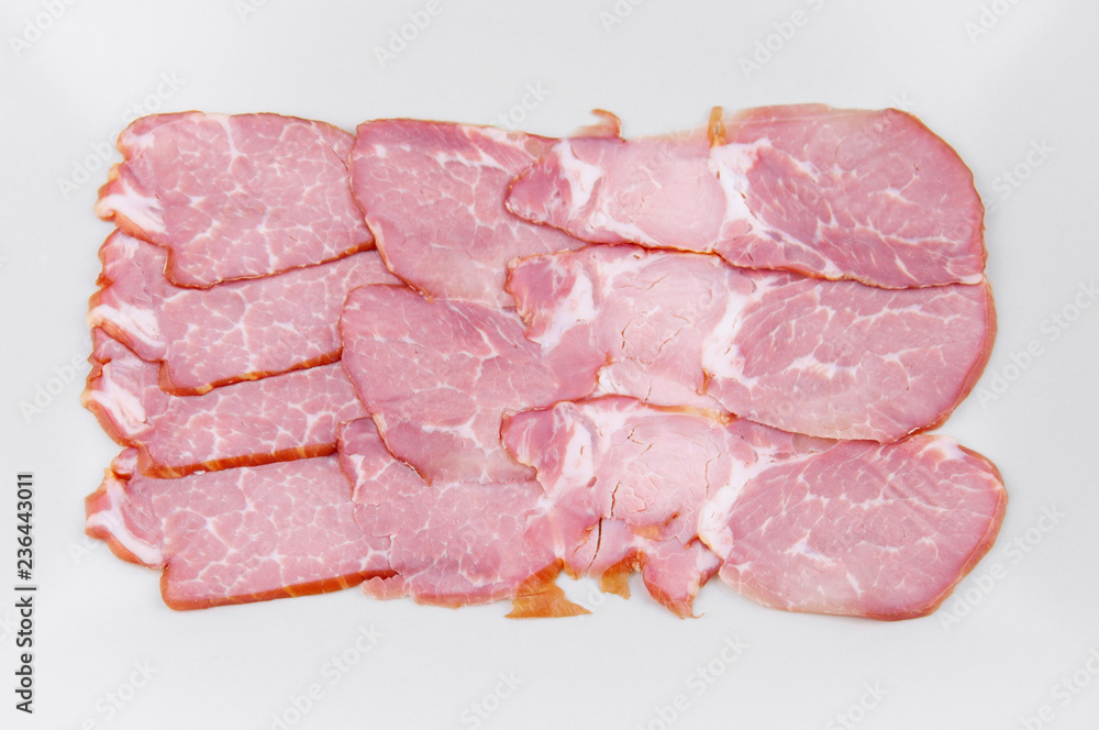 meat sliced in a rectangular shape on a light background