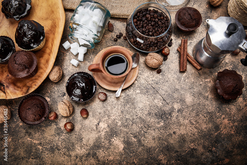 Crafting coffee in clay cup with bean cezve and chocolate cake photo