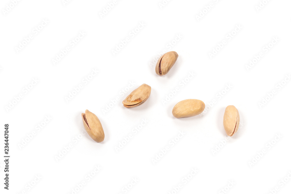 Obraz premium Pistachio nuts on white background