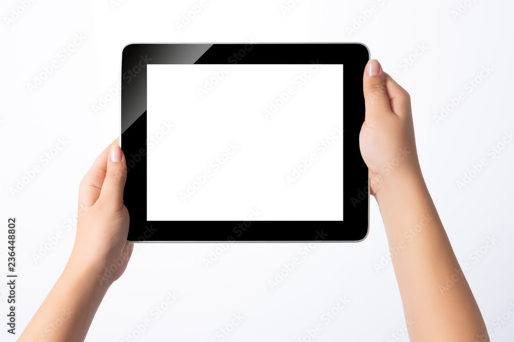 Hand holding blank screen tablet pc on white background