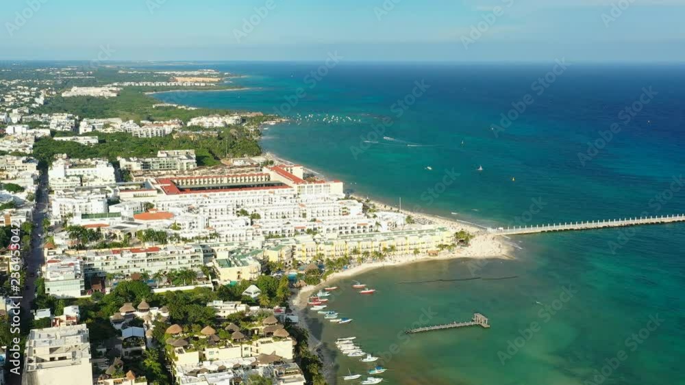 Aerial view of cityscape of Playa del Carmen, famous resort city by Caribbean Sea - landscape panorama of Yucatan Peninsula from above, Mexico, Central America, 4k UHD Aerial view of cityscape of Playa del Carmen, famous resort city by Caribbean Sea - landscape panorama of Yucatan Peninsula from above, Mexico, Central America, 4k UHD
