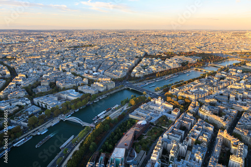 Aerial: Cityscape of Paris in sunset © castenoid