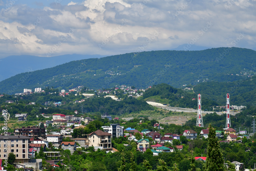 Fototapeta premium View of city of Sochi on the background of mountains, Russia