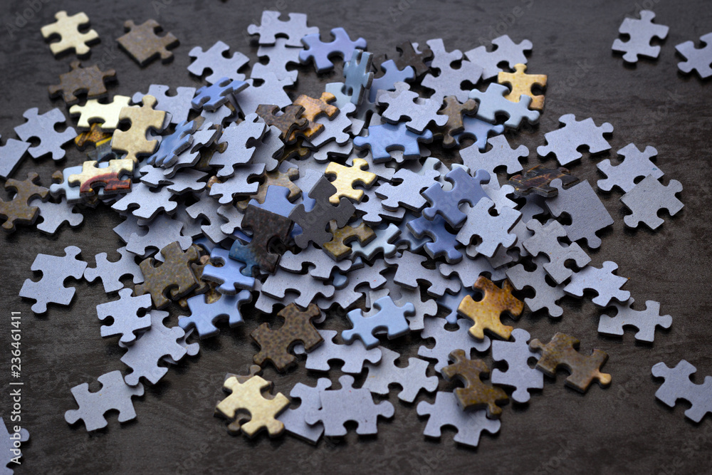 Rendition Mexico Bless Puzzle pieces on a wooden surface, closeup, top view. A puzzle is a puzzle  from small pieces. Texture of puzzles. Copy space Stock Photo | Adobe Stock
