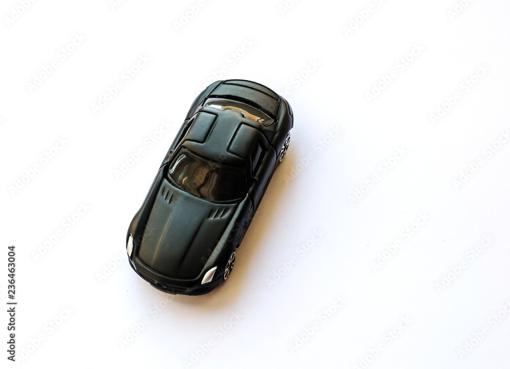 toy black machine on a white background toy black machine on a white background