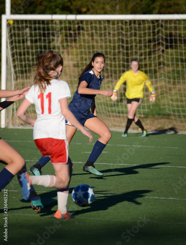 Defender watching the ball