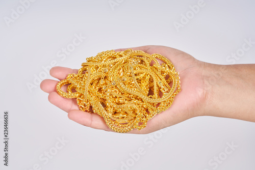 Gold jewelry on white background