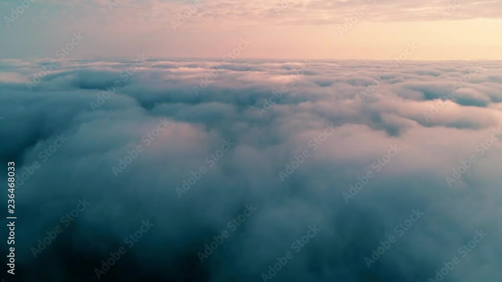Aerial view of clouds and sky. Drone flies very high in evening sky. Romantic nature landscape Aerial view of clouds and sky. Drone flies very high in evening sky. Romantic nature landscape