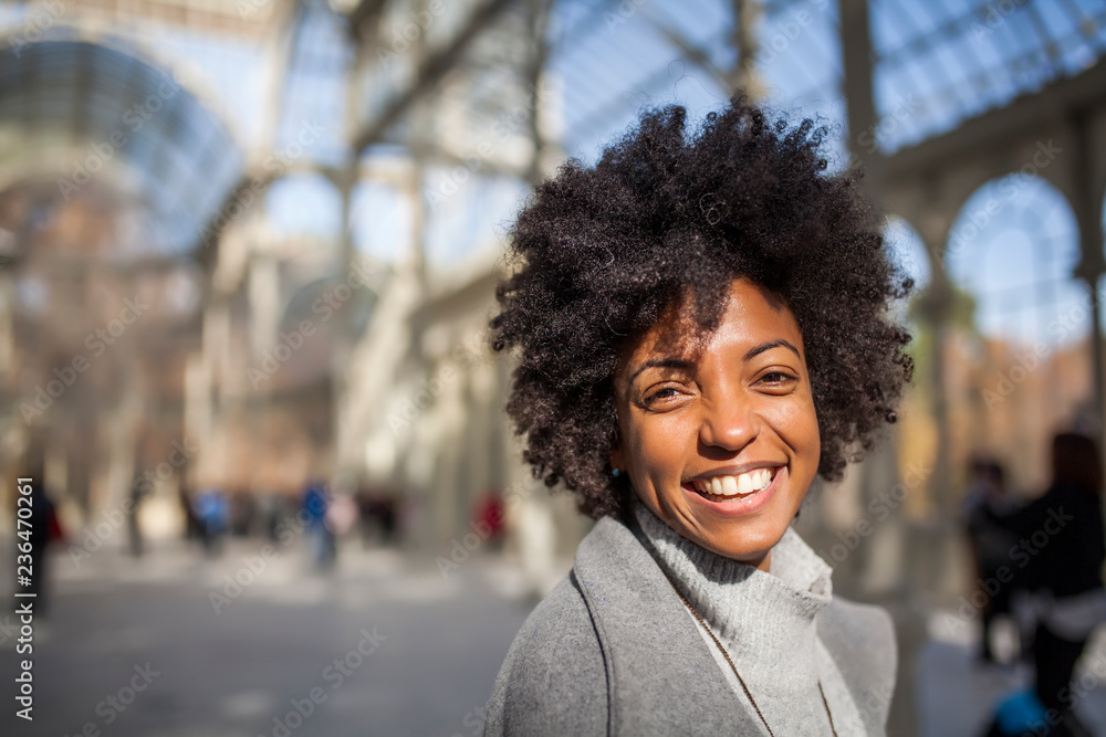Afro woman having fun in the park Afro woman having fun in the park