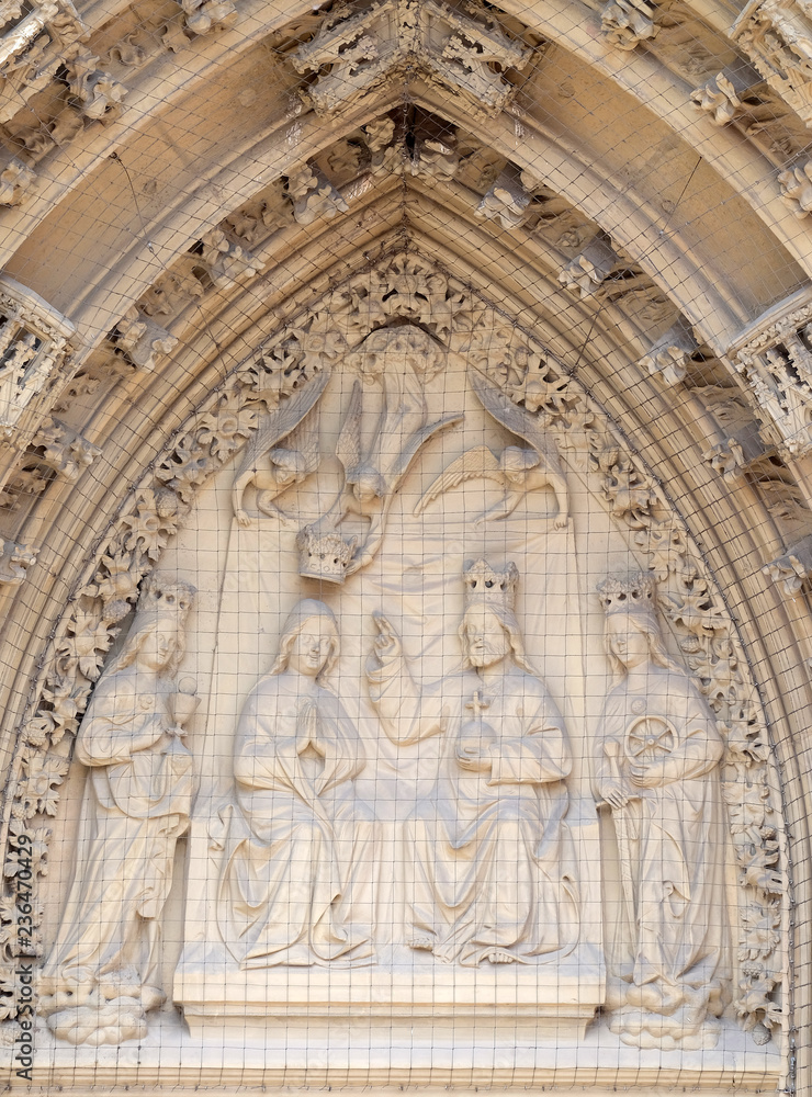 The tympanum shows the Coronation of the Virgin portal of the Marienkapelle in Wurzburg, Bavaria, Germany