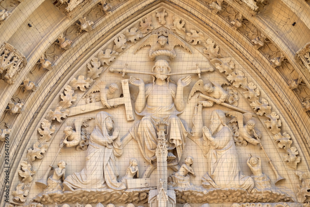 The tympanum shows the Last Judgment, portal of the Marienkapelle in Wurzburg, Bavaria, Germany The tympanum shows the Last Judgment, portal of the Marienkapelle in Wurzburg, Bavaria, Germany
