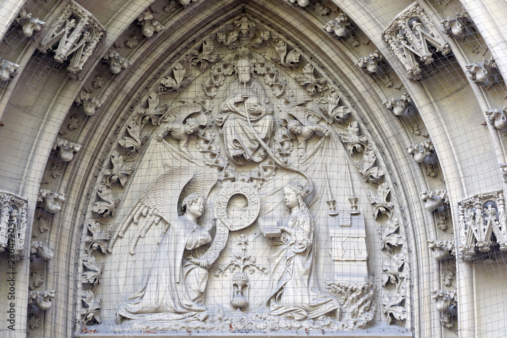 The tympanum shows the Annunciation to Mary, portal of the Marienkapelle in Wurzburg, Bavaria, Germany The tympanum shows the Annunciation to Mary, portal of the Marienkapelle in Wurzburg, Bavaria, Germany