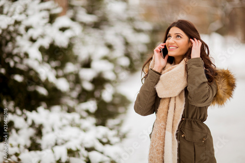 Smiling young woman with ce...